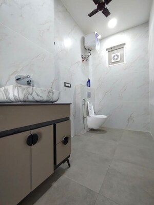 Bathroom in 4 BHK Apartment at Vivek Vihar – for Rent