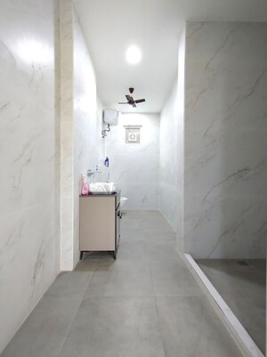 Bathroom in 4 BHK Apartment at Vivek Vihar – for Rent