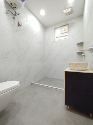 Bathroom in 4 BHK Apartment at Vivek Vihar – for Rent