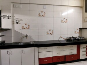 Kitchen in 3 BHK Apartment at Mani Nagar – for Sale