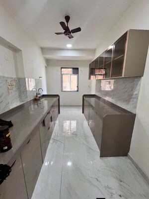 Kitchen in 2 BHK Apartment at Mahavir Sadhana CHS, Vashi Sector 14 – for Rent