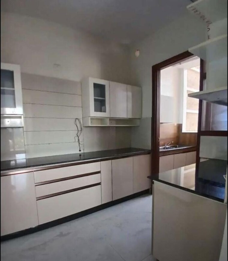 Kitchen, malwa-escon-primera 3 Bedroom 1550 Sq.Ft. Apartment In International Airport Road Zirakpur 10578899