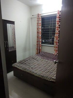 Bedroom in 2 BHK Apartment at Vardhaman Palm Rose, Punawale – for Rent