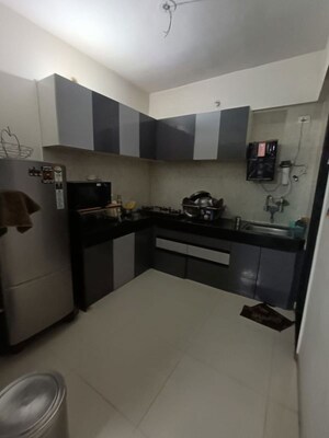 Kitchen in 2 BHK Apartment at Vardhaman Palm Rose, Punawale – for Rent