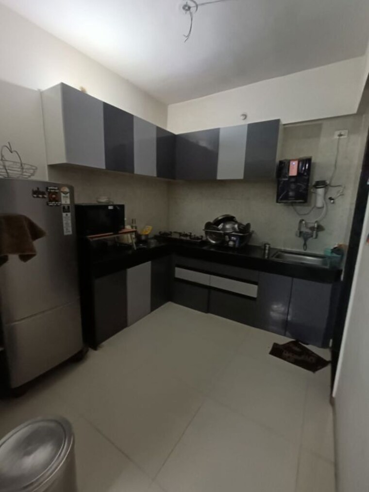 Kitchen, vardhaman-palm-rose 2 Bedroom 950 Sq.Ft. Apartment In Punawale Pune 10578910