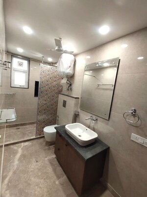Bathroom in 4 BHK Apartment at Greater Kailash – for Sale