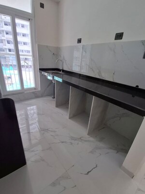 Kitchen in 2 BHK Apartment at Ruparel Sky Green, Kandivali West – for Rent