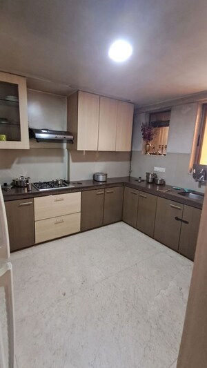 Kitchen in 4 BHK Apartment at Satra Residency, Khar West – for Sale