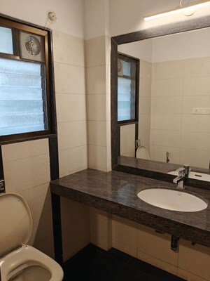 Bathroom in 3 BHK Apartment at Mira Recidency, Kalyani Nagar – for Rent
