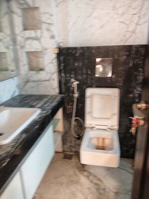 Bathroom in 4 BHK Builder Floor at Safdarjung Development Area – for Rent