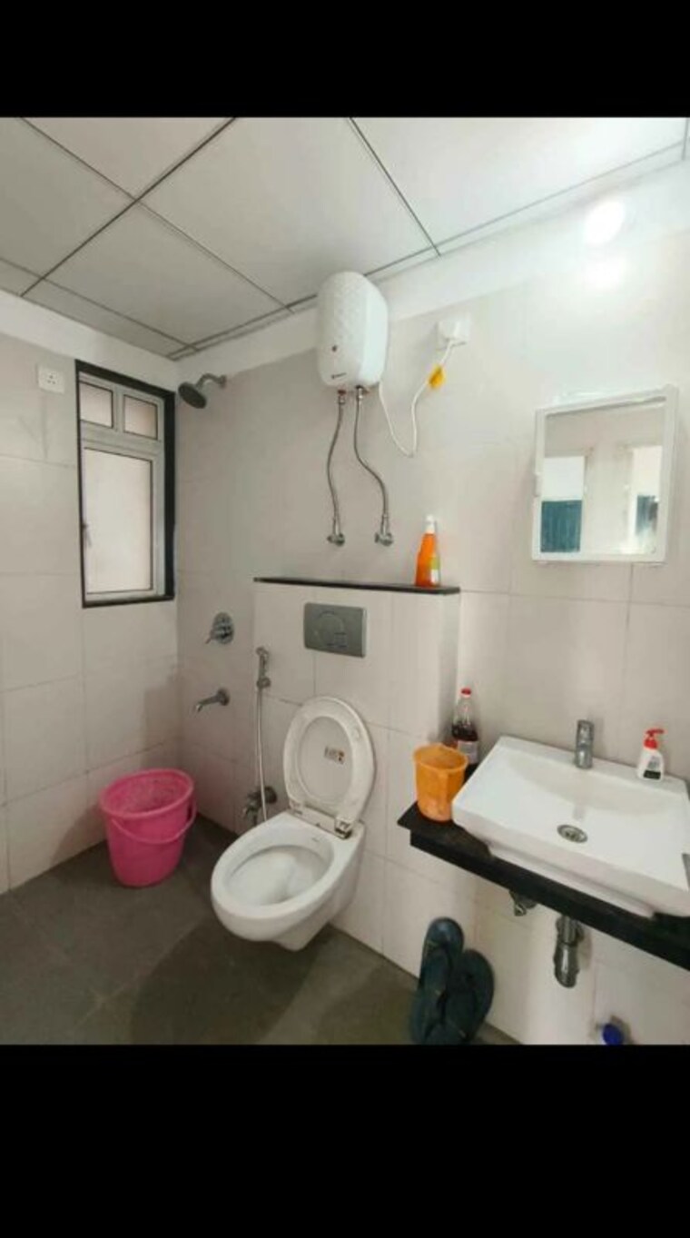 Bathroom, godrej-greens 2 Bedroom 630 Sq.Ft. Apartment In Undri Pune 10579432