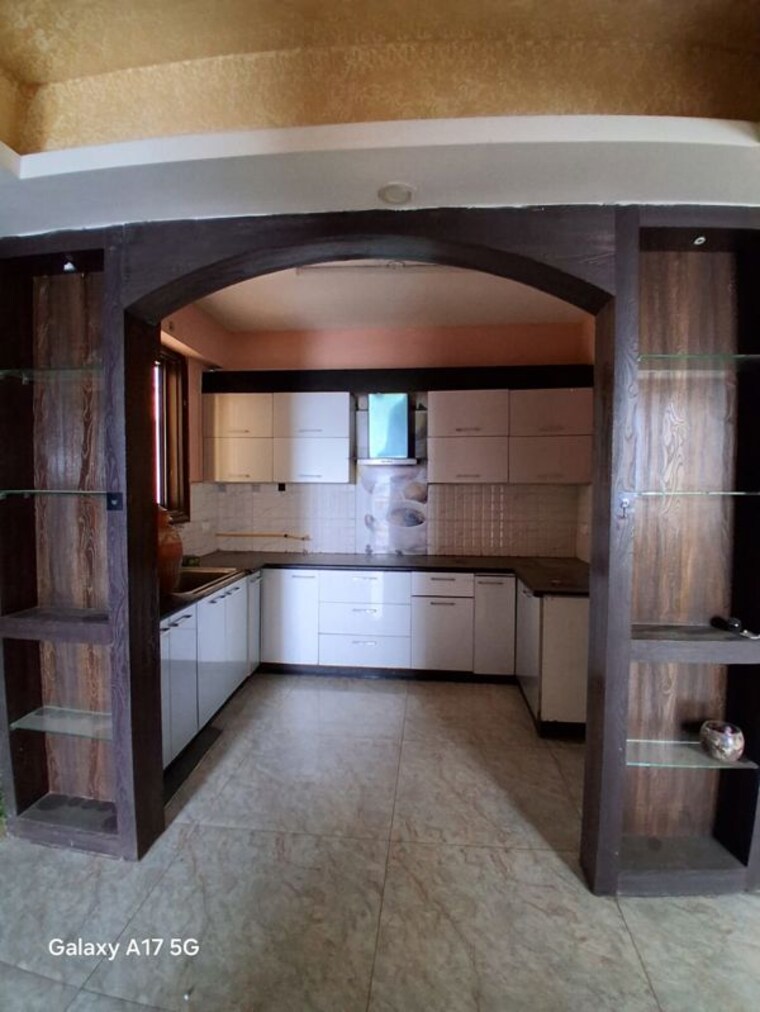 Kitchen, assotech-the-nest 2.5 Bedroom 1285 Sq.Ft. Apartment In Sain Vihar Ghaziabad 10579549