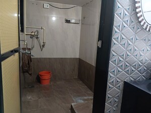 Bathroom in 1 BHK Apartment at Anu Nagar CHS, Vijay Nagari – for Rent