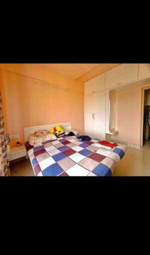 Bedroom in 2 BHK Penthouse at Kolte Patil Margosa Heights, Mohammadwadi – for Sale