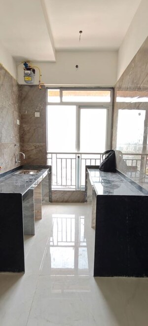 Kitchen in 2 BHK Apartment at DGS Sheetal Ekta, Malad East – for Rent