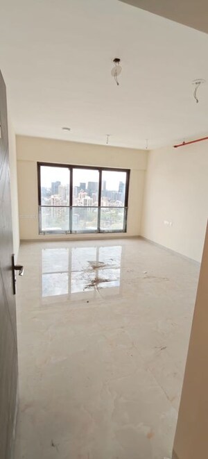 Room in 2 BHK Apartment at IM Applaud 38, Goregaon East – for Rent