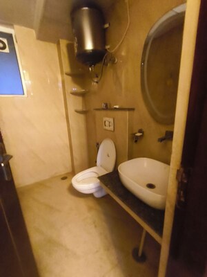 Bathroom in 3 BHK Apartment at Affinity Greens, International Airport Road – for Rent