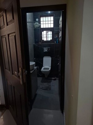 Bathroom in 3 BHK Builder Floor at Guru Nanak Enclave, Dhakoli – for Rent