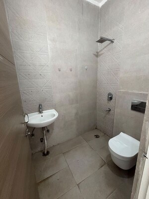 Bathroom in 3 BHK Builder Floor at Motia Blue Ridge, Dhakoli – for Sale