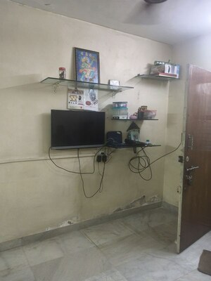 Living Room in 1 BHK Apartment at Vile Parle West – for Rent