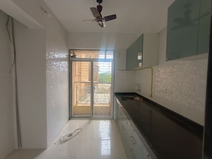 Kitchen in 2.5 BHK Apartment at Vipul Mahavir Sapphire, Ghansoli – for Rent