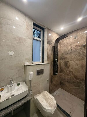 Bathroom in 3 BHK Builder Floor at East Of Kailash – for Sale