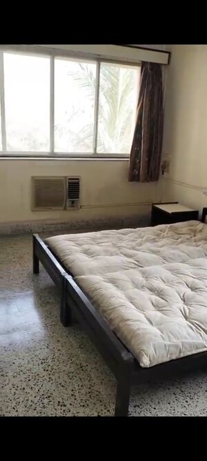 Bedroom in 2 BHK Apartment at Nalanda CHS, Vashi Sector 17 – for Rent