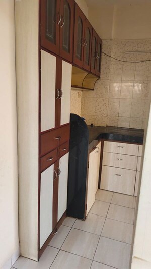 Kitchen in 2 BHK Apartment at Mahavir Vaibhav, Kopar Khairane – for Rent