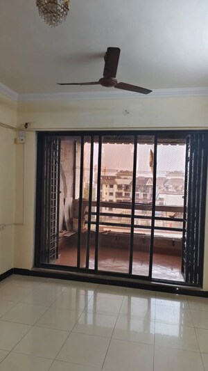 Room in 2 BHK Apartment at Mahavir Vaibhav, Kopar Khairane – for Rent