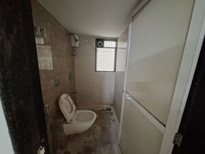 Bathroom in 2 BHK Apartment at Aaradhana Jai Matadee, Bhaskar Colony – for Rent