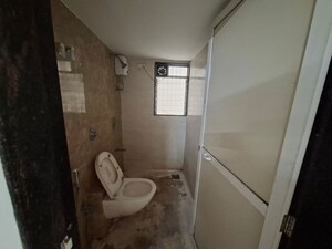Bathroom in 2 BHK Apartment at Aaradhana Jai Matadee, Bhaskar Colony – for Rent