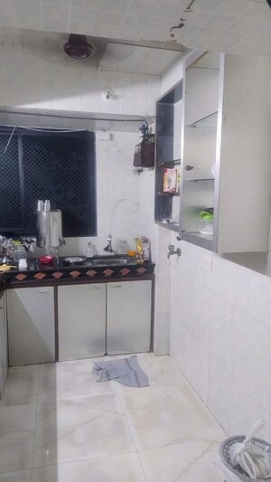 Kitchen in 3 BHK Apartment at Kalash Udyan, Kopar Khairane – for Rent