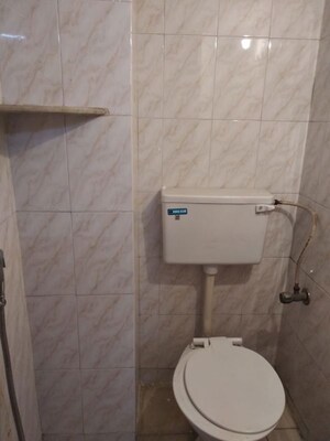Bathroom in 2 BHK Apartment at Athshree CHS, Kopar Khairane – for Rent