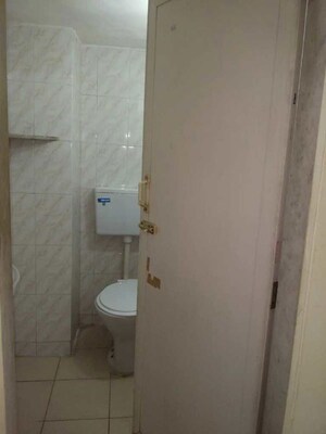 Bathroom in 2 BHK Apartment at Athshree CHS, Kopar Khairane – for Rent