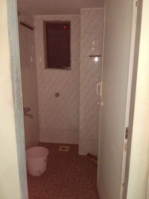 Bathroom in 2 BHK Apartment at Athshree CHS, Kopar Khairane – for Rent