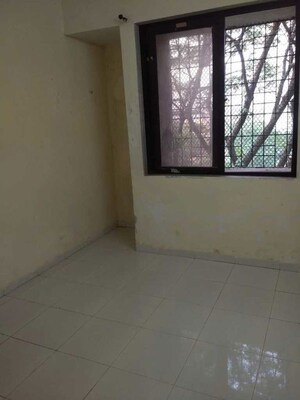 Room in 2 BHK Apartment at Vimla Plaza, Ghansoli – for Rent