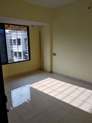 Room in 2 BHK Apartment at Vimla Plaza, Ghansoli – for Rent
