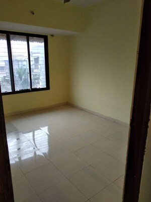 Room in 2 BHK Apartment at Vimla Plaza, Ghansoli – for Rent