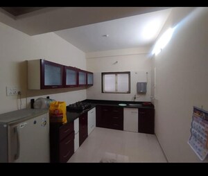 Kitchen in 2 BHK Apartment at Essentia CHS, Rahatani – for Rent