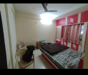 Bedroom in 2 BHK Apartment at Essentia CHS, Rahatani – for Rent