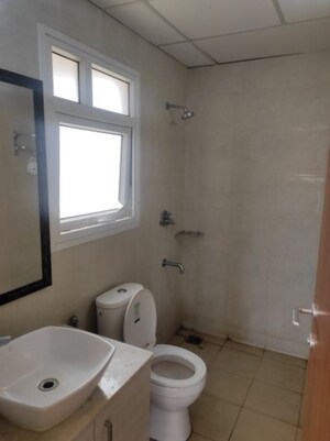 Bathroom in 2 BHK Apartment at Bhartiya Nikoo Homes Phase 2, Thanisandra Main Road – for Sale