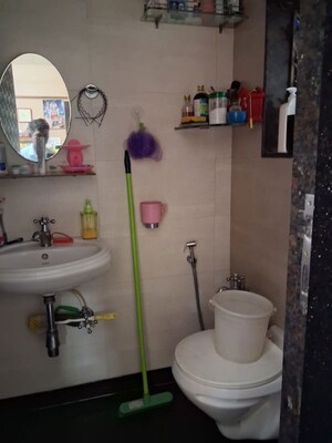 Bathroom in 2 BHK Apartment at Midcity The Chakravarti Ashok CHSL, Andheri East – for Rent