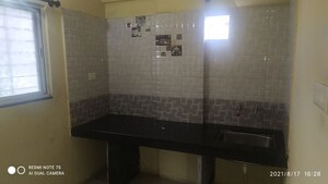 Kitchen in 1 BHK Apartment at Suyog Nisarg, Wagholi – for Sale
