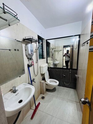 Bathroom in 2 BHK Apartment at Unnathi Woods Phase 1 And 2, Ghodbunder Road – for Rent