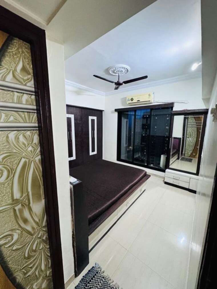 Bedroom, unnathi-woods-phase-1-and-2 2 Bedroom 900 Sq.Ft. Apartment In Ghodbunder Road Thane 10580087