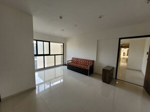 Living Room in 2 BHK Apartment at Lodha Splendora, Ghodbunder Road – for Rent