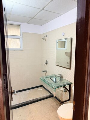 Bathroom in 4 BHK Apartment at Elite Golf Green, Sector 79 – for Rent