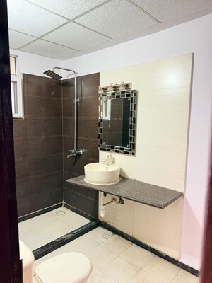 Bathroom in 4 BHK Apartment at Elite Golf Green, Sector 79 – for Rent