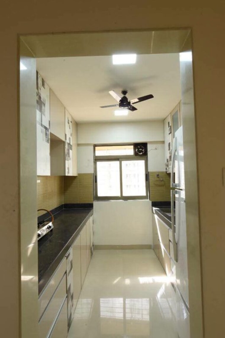 Kitchen, lodha-amara-tower-44 3 Bedroom 950 Sq.Ft. Apartment In Kolshet Road Thane 10580220