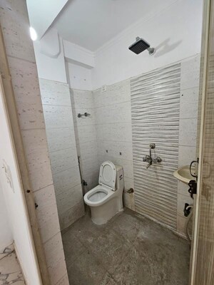 Bathroom in 2 BHK Apartment at Chattarpur – for Sale
